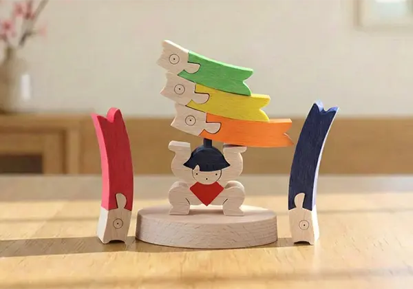 鯉のぼりを揚げる金太